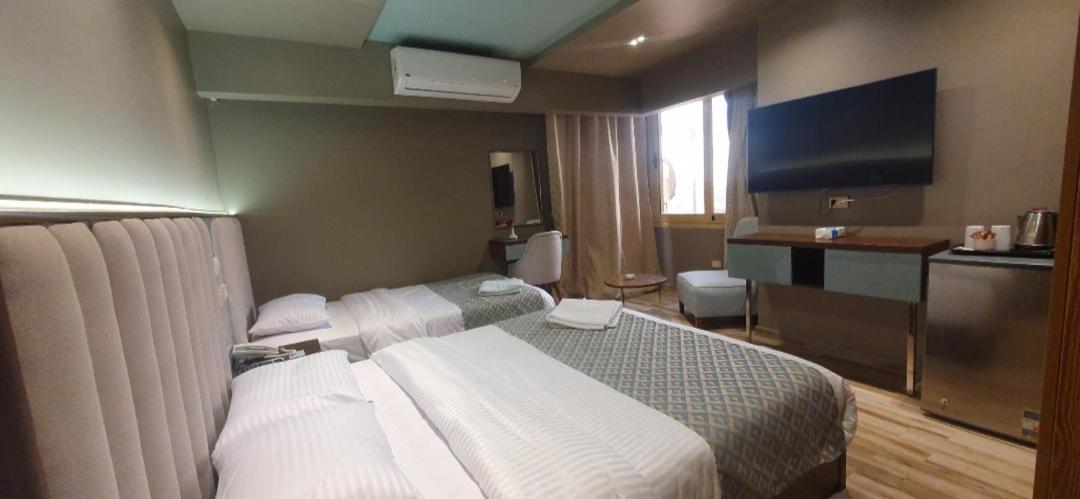 Grand Bayan Hotel & Apt At Nile Plaza Il Il Cairo Camera foto